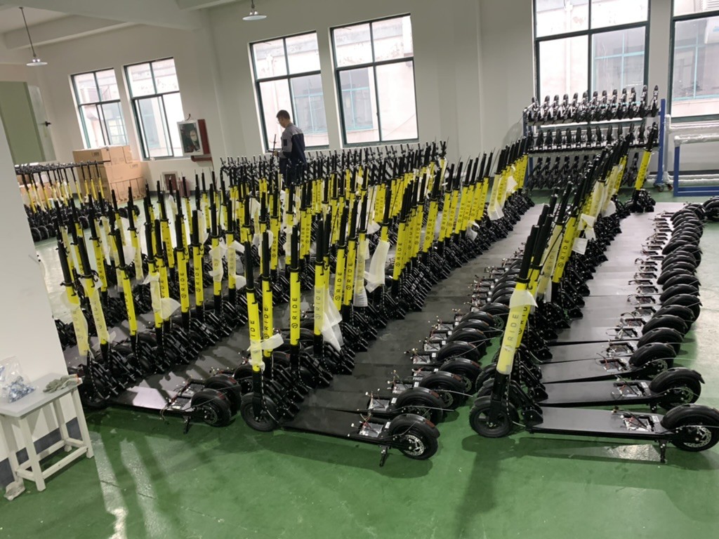 Rows of Ride scooters lined up at the factory during trial production